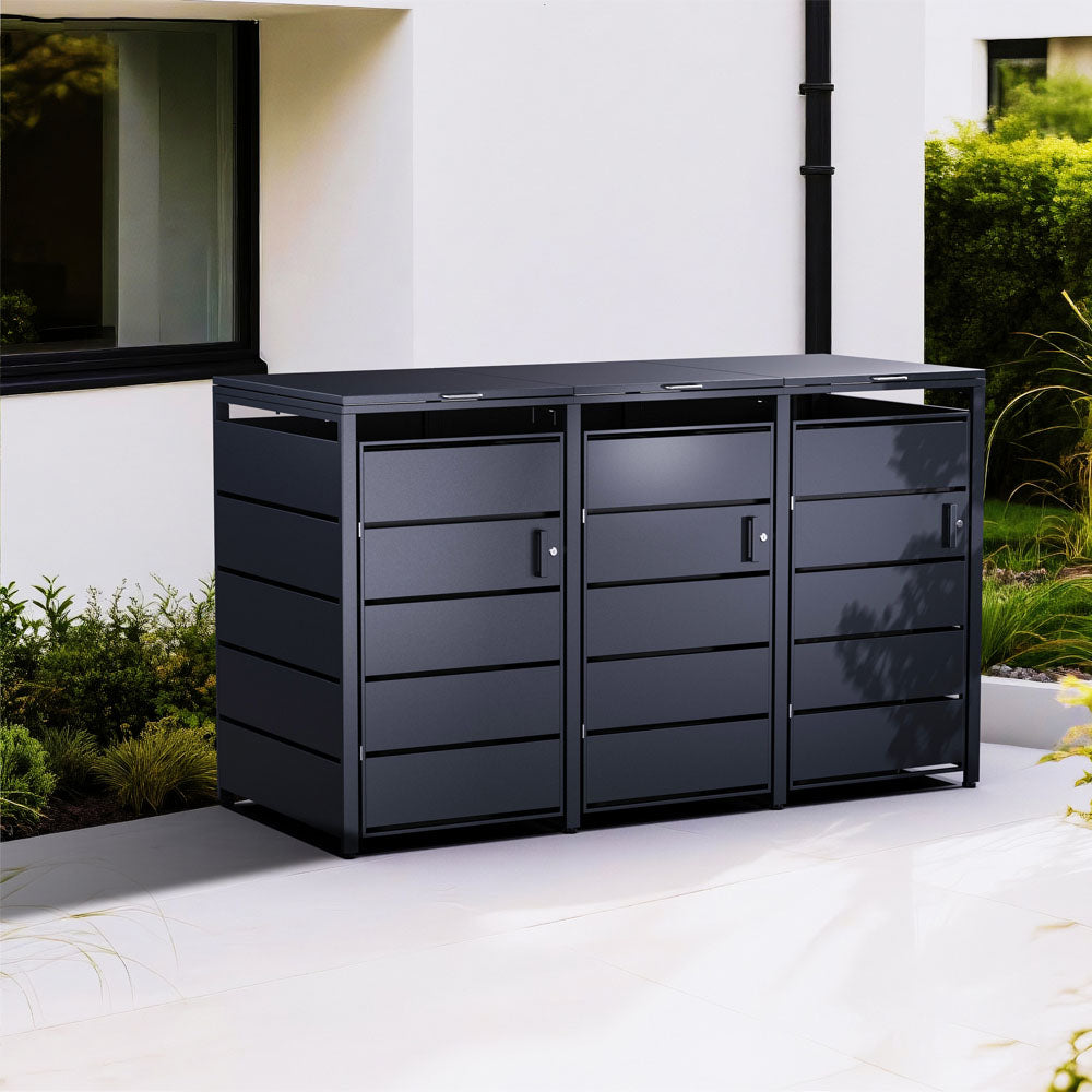 Große Mülltonnenbox aus Stahl in Anthrazit, vor modernem Wohnhaus.1