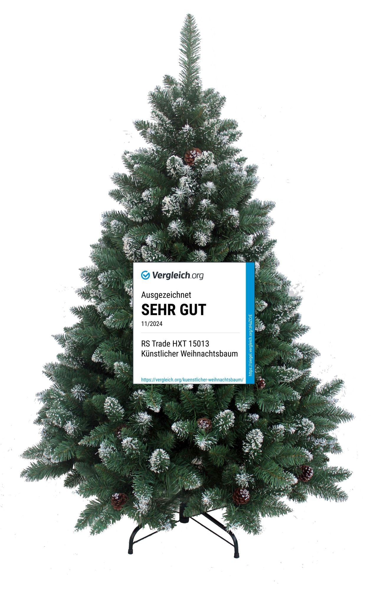 Künstlicher Weihnachtsbaum mit Schneespitzen, Tannenzapfen und „Sehr gut“-Testsiegel am Stamm. 270 cm